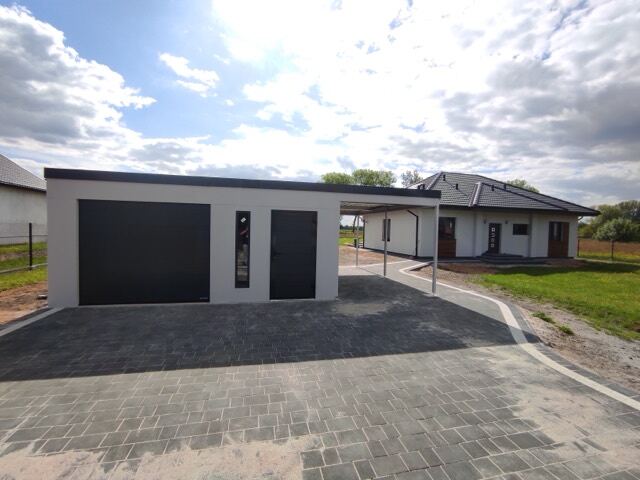 Großraumgarage + Anbaucarport in Freising von FF Garagen